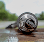 The magnetostrictive transducer drives indenter pins, which impact the base metal surface, creating a plastically deformed surface layer while coupling the ultrasonic transducer to the base metal transmitting ultrasound through the thickness of the base metal / weld HAZ