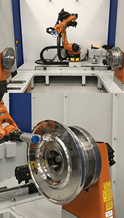 Figure 4: ISO 17025 accredited StressTech Xstress Robot system (up) performing measurements on a nickel disc (down)