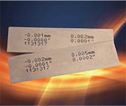 Peening Accessories Almen strips: Every strip is laser-measured for its flatness. The results, including lot number for traceability, are printed on the strip. An additional mass finishing process removes all burrs.