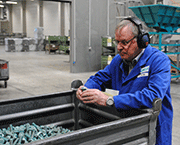 Johan de Hek, Plant Manager at Benseler Oberflächentechnik (Lüdenscheid Plant), checks workpieces prior to shipping