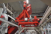 Loading an AGTOS drum-type blasting machine with workpieces (fastening elements)