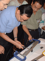 Michael Lin, Manufacturing Engineer at ATS during his first experience with flapper peening