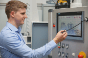 Christopher Fritz Dietrich, Project Engineer for factory planning and organisation, demonstrates the ease of operation on the clearly arranged panel
