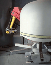 The radome is shotblasted with a special shotblasting media that is based on wheat starch. A special software makes the robot hand follow the contour of the component  automatically.