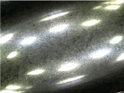 Photo 6: Mass finishing creates a mono-directional (isotropic) surface finish, a major advantage over robotic grinding and buffing!