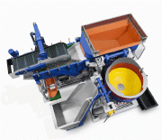 A Turbotron (TT) centrifugal disk finishing system of double batch version