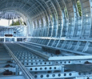 Before being assembled, numerous fuselage and wing components must undergo deburring and surface smoothing