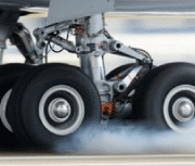 Compared to manual deburring—such as for landing gear struts—mass finishing produces much more consistent results and reduces cycle time by more than 90%