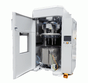 The workpiece fixtures, with mounted raw knee femurs, are clamped to the rotating spindles of the Multi-Surf Finisher. Each spindle is equipped with a servo motor. The actual finishing process takes place in a rotating processing bowl filled with grinding and polishing media.