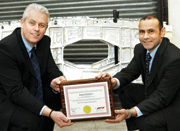 Christian Tyroll and Tony Grammauro celebrate the Impact Finishers Nadcap accreditation