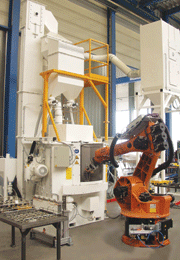 RDT 150 S-5: Gearbox components are descaled and compressed (shotpeened) in the robot-aided satellite rotary table system.