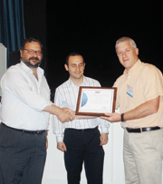 From left to right, Pedro Arroyo Perfumo (EADS-CASA), Alberto Portal (EADS-CASA) accept NUCAP certificate from NUCAP Chairperson, Jon Biddulph (Rolly-Royce plc).