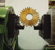 Figure 4: Bending fatigue tests of gear teeth performed with a resonance pulsator (Labs, Department of Mechanical Engineering, Politecnico di Milano, Italy)