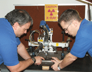 Kevin Roper (left) and Eric Merritt discuss measurements