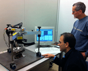 Mario in the Labs with technician Piero Pellin preparing a XRD residual stress measurement on a shaft